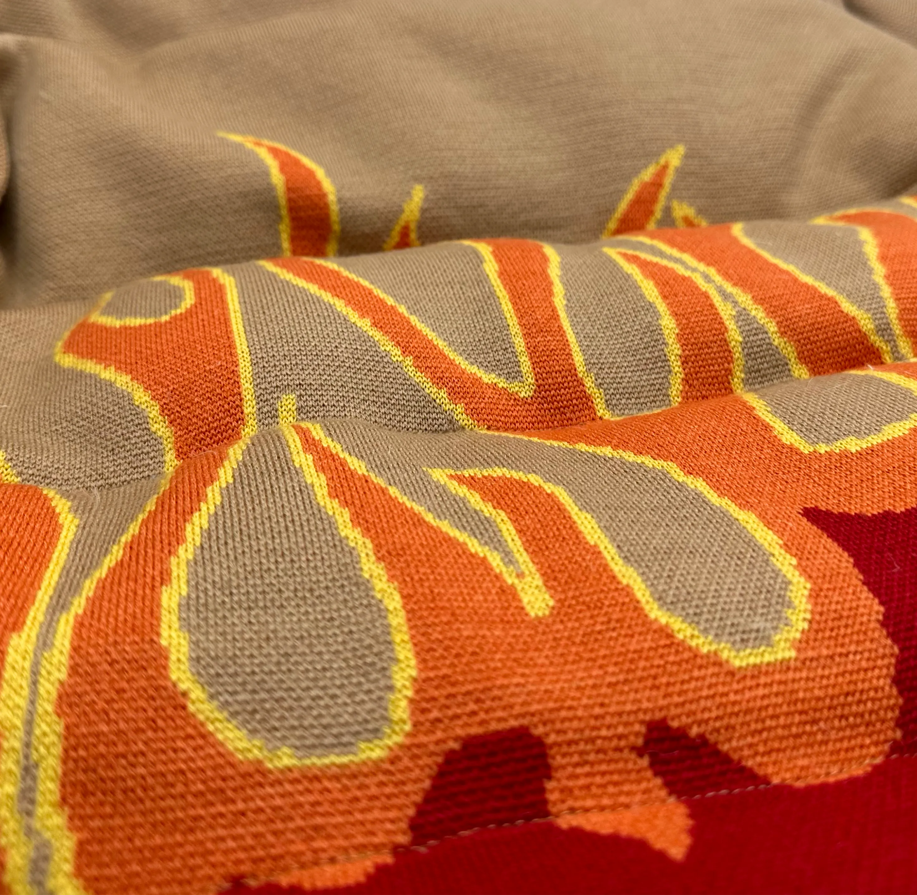 UP IN FLAMES SWEATER PUFFER